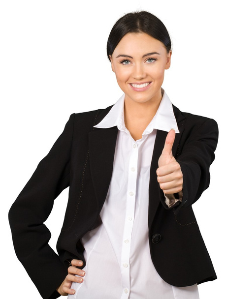  businesswoman standing  with thumbs up  - 写真・画像