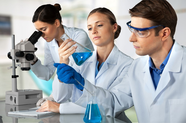  scientists working at the laboratory - Zdjęcie, obraz