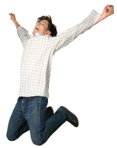 handsome happy young man jumping - Φωτογραφία, εικόνα