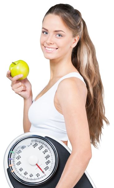 woman with apple and scales - Photo, image
