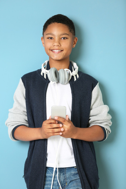African American boy with headphones - 写真・画像