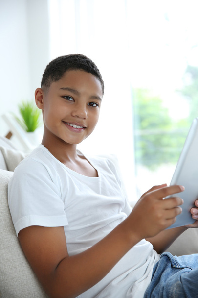 African American boy with tablet  - Fotó, kép
