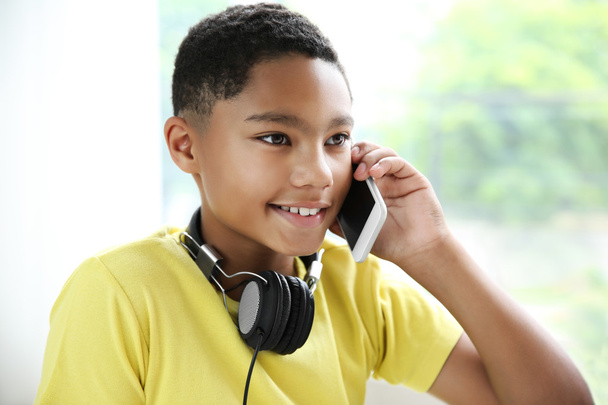 African American boy with headphones  - Fotó, kép
