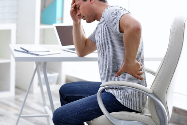 Man suffering from back pain - Zdjęcie, obraz