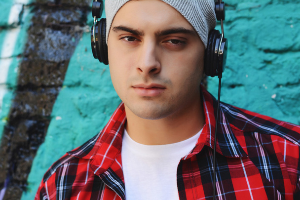 Young man with headphones - 写真・画像