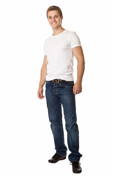 Longitud completa de un joven lindo en jeans y camiseta
 - Foto, imagen