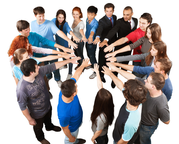 Mosolygós kollégák csoportja, kezét összerakva, csapatmunka koncepció - Fotó, kép