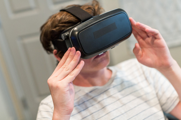 Teenage boy and VR goggles - Photo, Image
