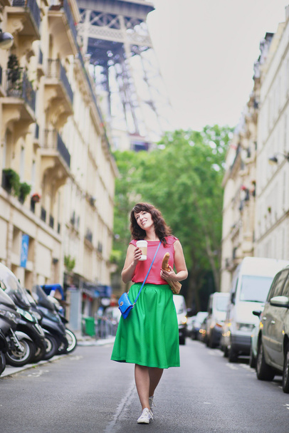 French woman walking with coffee to go and baguette - Foto, immagini