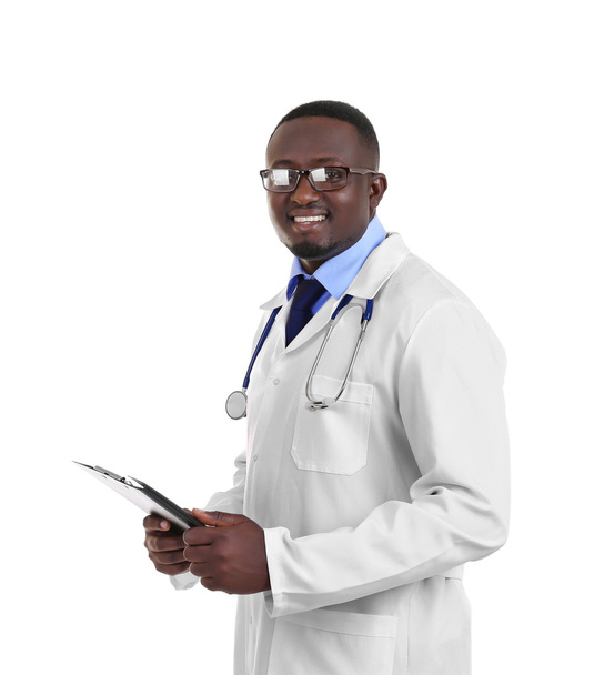 Professional African doctor with clipboard  - Φωτογραφία, εικόνα