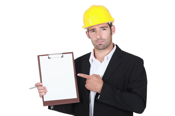 Foreman pointing at clipboard - Foto, Imagen