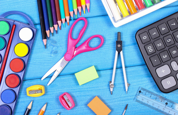 School accessories on blue boards, back to school concept - Photo, Image