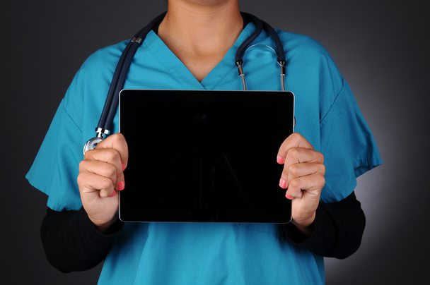 Nurse Holding Table Computer - Valokuva, kuva