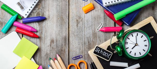 Assortment of office and school supplies on wooden table - Photo, Image