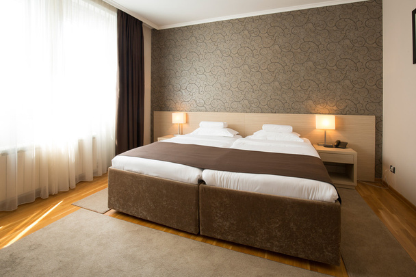 Modern elegant hotel bedroom interior - Φωτογραφία, εικόνα