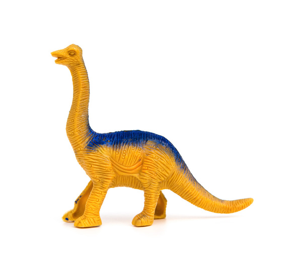 juguete brachiosaurus vista lateral sobre un fondo blanco
 - Foto, imagen
