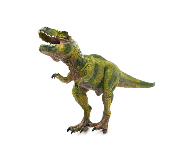 brinquedo tiranossauro verde em um fundo branco
 - Foto, Imagem