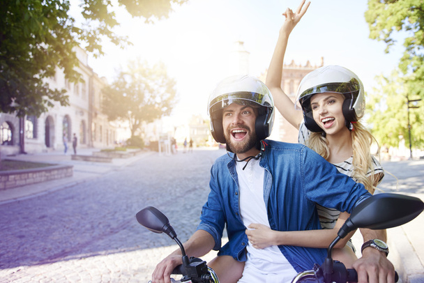 Ehepaar auf Motorrad mit Helm  - Foto, Bild