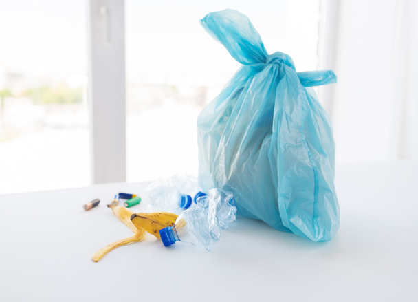 close up of rubbish bag with trash at home - Zdjęcie, obraz