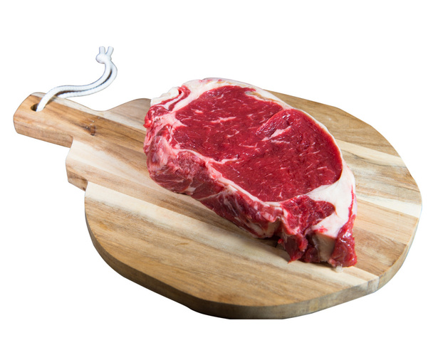 Entrecote steak of beef on a wooden board - 写真・画像