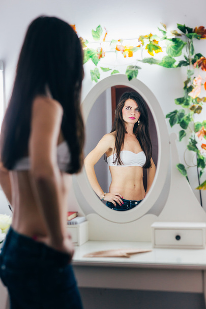 Charming female in the mirror  - Foto, afbeelding