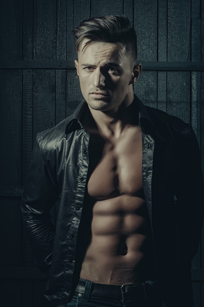 Man in shirt with muscular torso - Fotografie, Obrázek