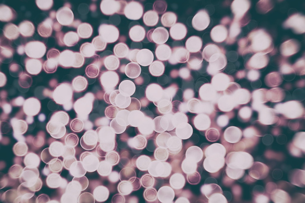 Abstract Festive background. Glitter vintage lights background with lights defocused. - Photo, Image