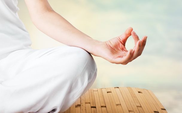 calm woman doing yoga exercise - Photo, Image