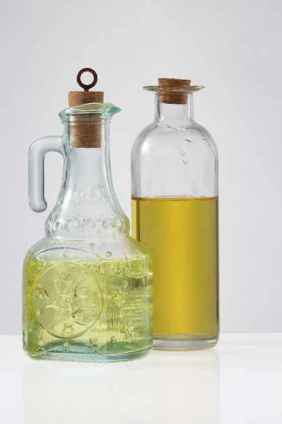 Assortment of oil in bottles - Fotoğraf, Görsel