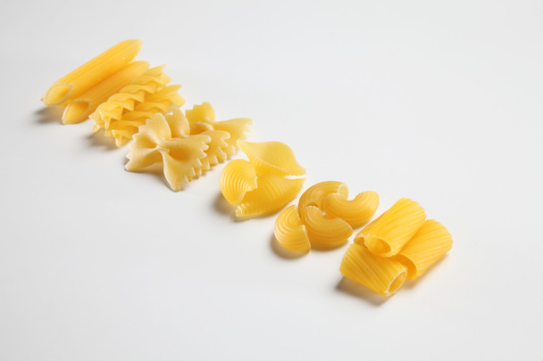 raw pasta on white  - Zdjęcie, obraz