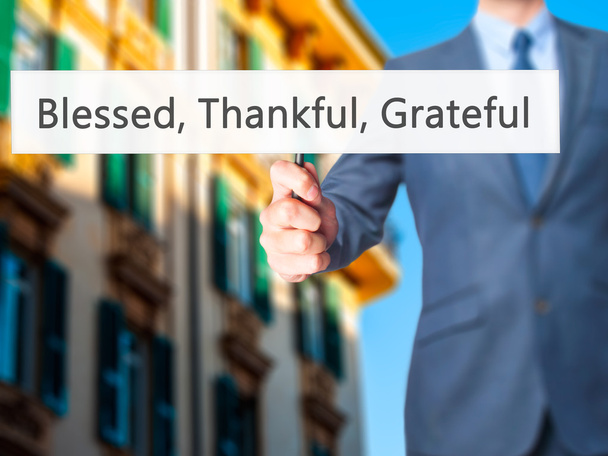 Błogosławiony wdzięczny Grateful - biznesmen ręka trzyma znak - Zdjęcie, obraz