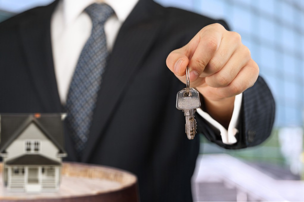 Real estate agent giving Key - Fotografie, Obrázek