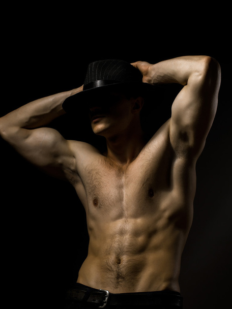 Sexy muscular man in hat - Fotó, kép
