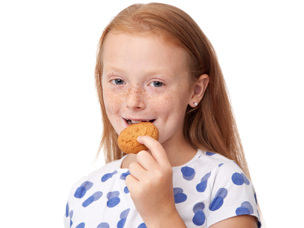 Child eating cookies - Photo, Image