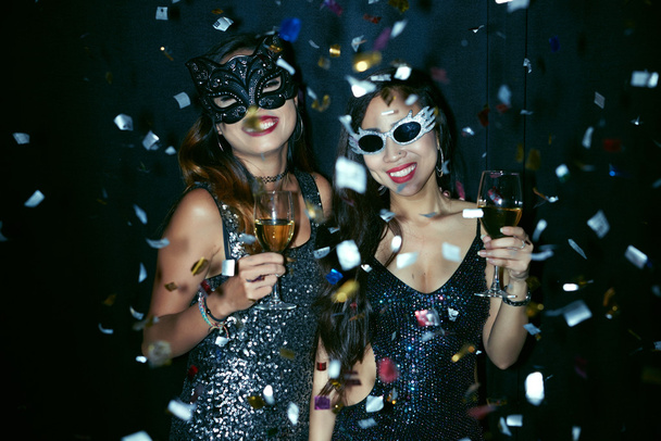 women in masks dancing at the party - Photo, Image