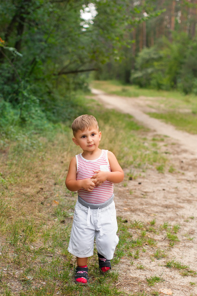 Boy playing outdoors - Фото, изображение