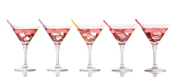 Red cocktail in martini glasses isolated on white - Photo, Image