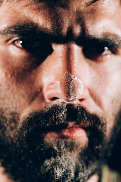 Cocaine on man's face - Fotoğraf, Görsel