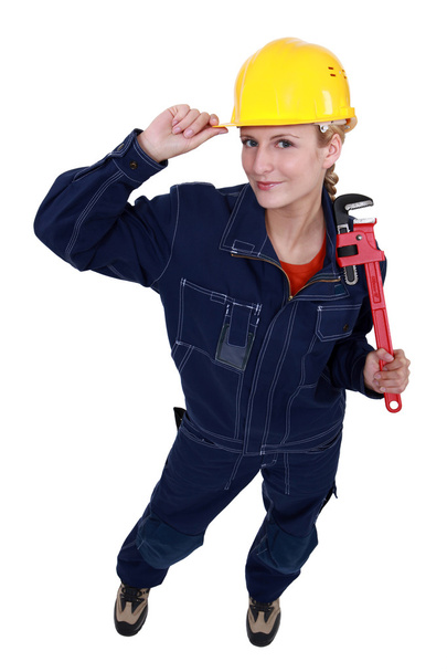 A female plumber. - Фото, изображение
