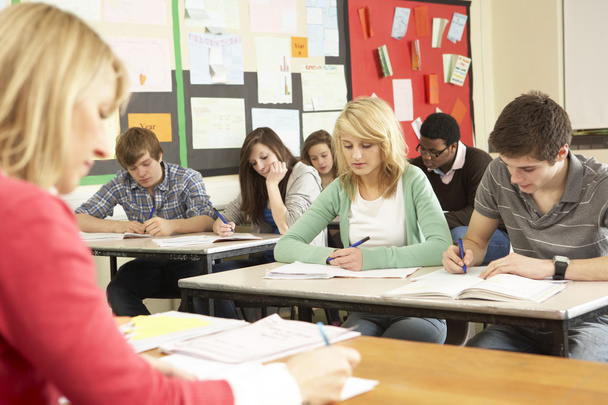 Teenage Students Studying In Classroom With Teacher - Fotoğraf, Görsel