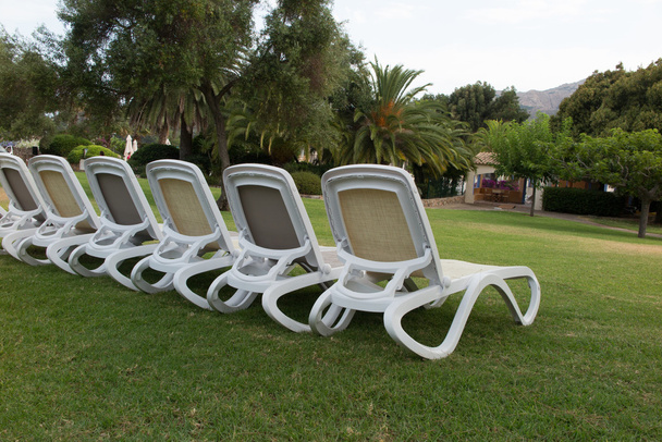 Deck chairs on the grass holidays summertime - Photo, Image