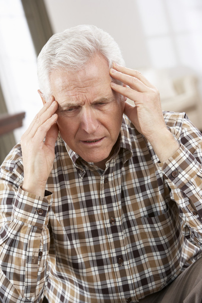 Senior Man Looking Stressed In Chair At Home - Photo, image