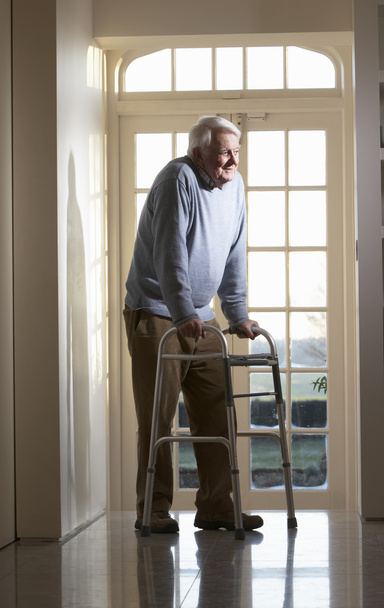 Elderly Senior Man Using Walking Frame - Fotó, kép