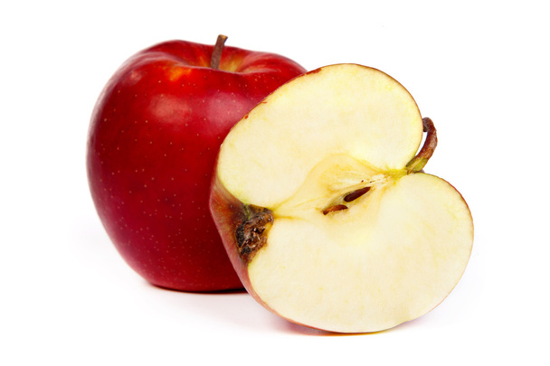 Cross section of red apple, showing pips, and core - 写真・画像