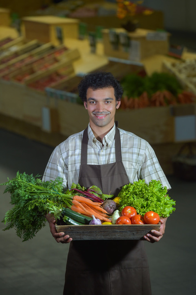 Portrait of Grocery clerk working in supermarket store - Photo, Image