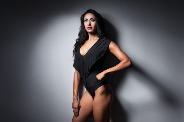 studio shot of perfect body of bodybuilder female; - Fotoğraf, Görsel
