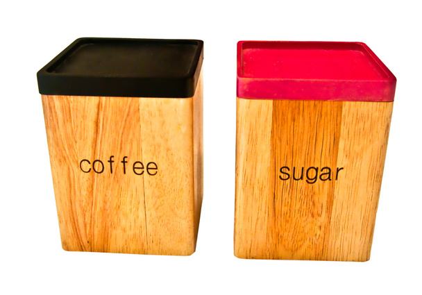 el Almacenamiento la caja de madera del café y el azúcar aislado sobre el fondo blanco b
 - Foto, Imagen