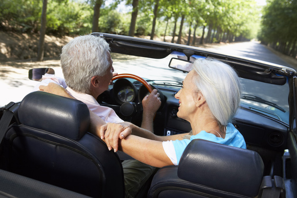Senior couple in sports car - Foto, Imagem