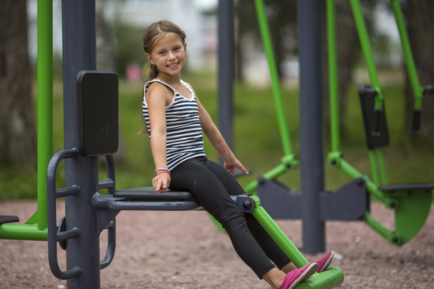 Little girl on Playground - Фото, зображення