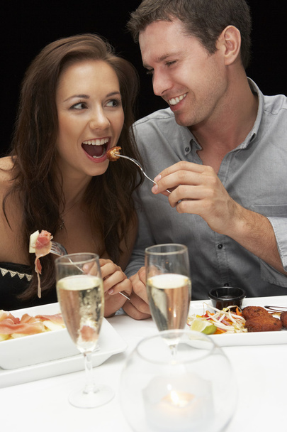 Young couple in restaurant - Φωτογραφία, εικόνα